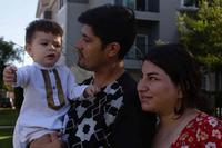 Afghan refugees Azita Jawady and husband Hamid Sadra at home in Austin.