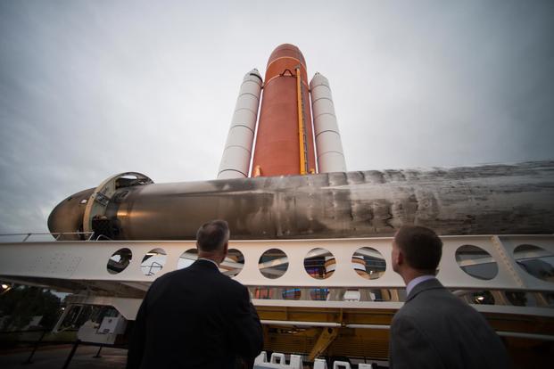 U.S. Marine Corps Gen. Joe Dunford, chairman of the Joint Chiefs of Staff, views one of SpaceX's two Falcon Heavy rocket boosters while attending a reception at the John F. Kennedy Space Center, Florida, Feb. 20, 2018. (DoD/U.S. Army Sgt. James K. McCann)